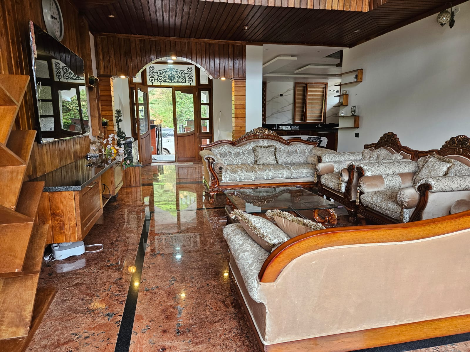 Hall seating area with sofa and warm lighting