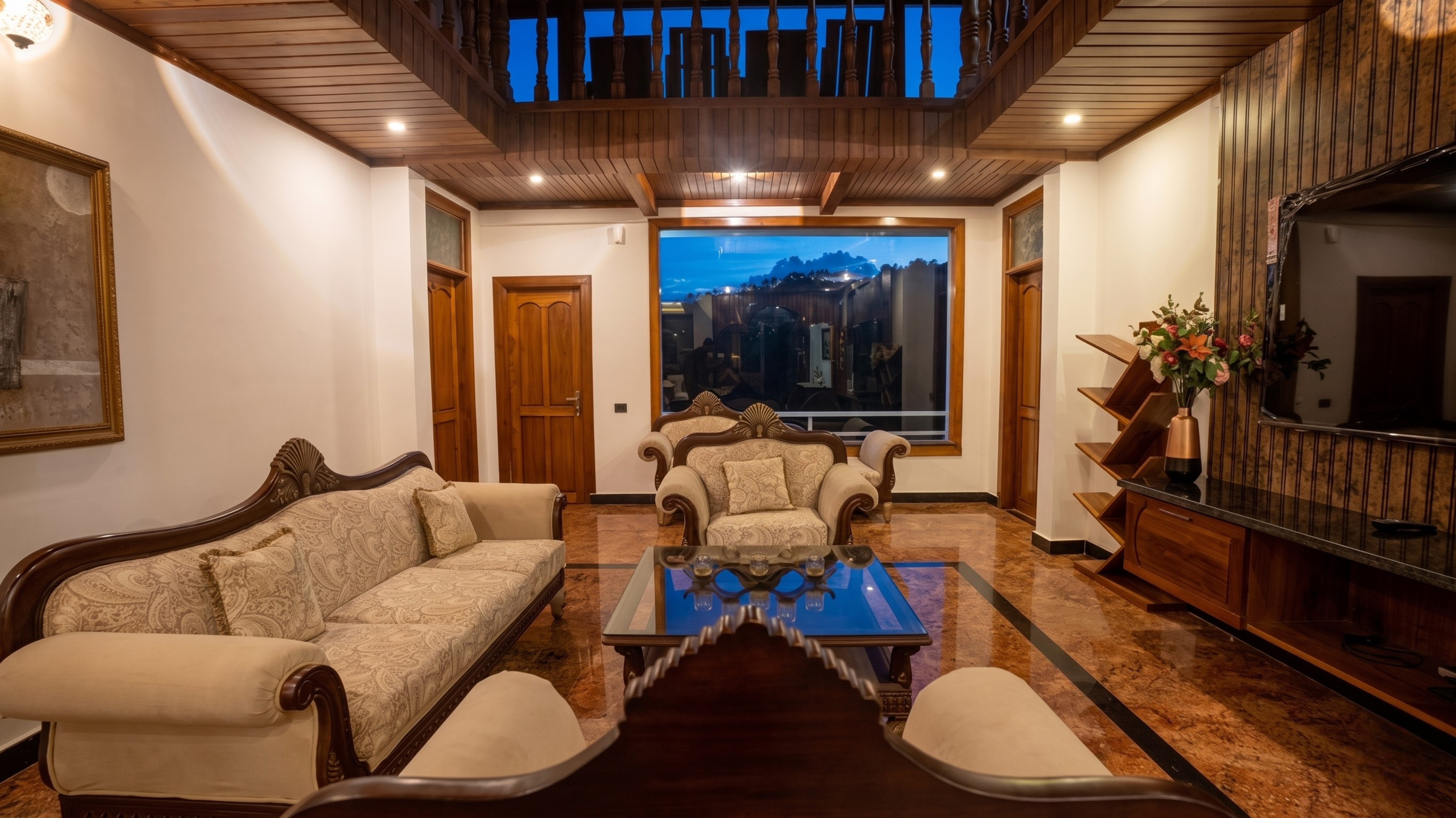 Living room interior with ornate sofa & warm lighting