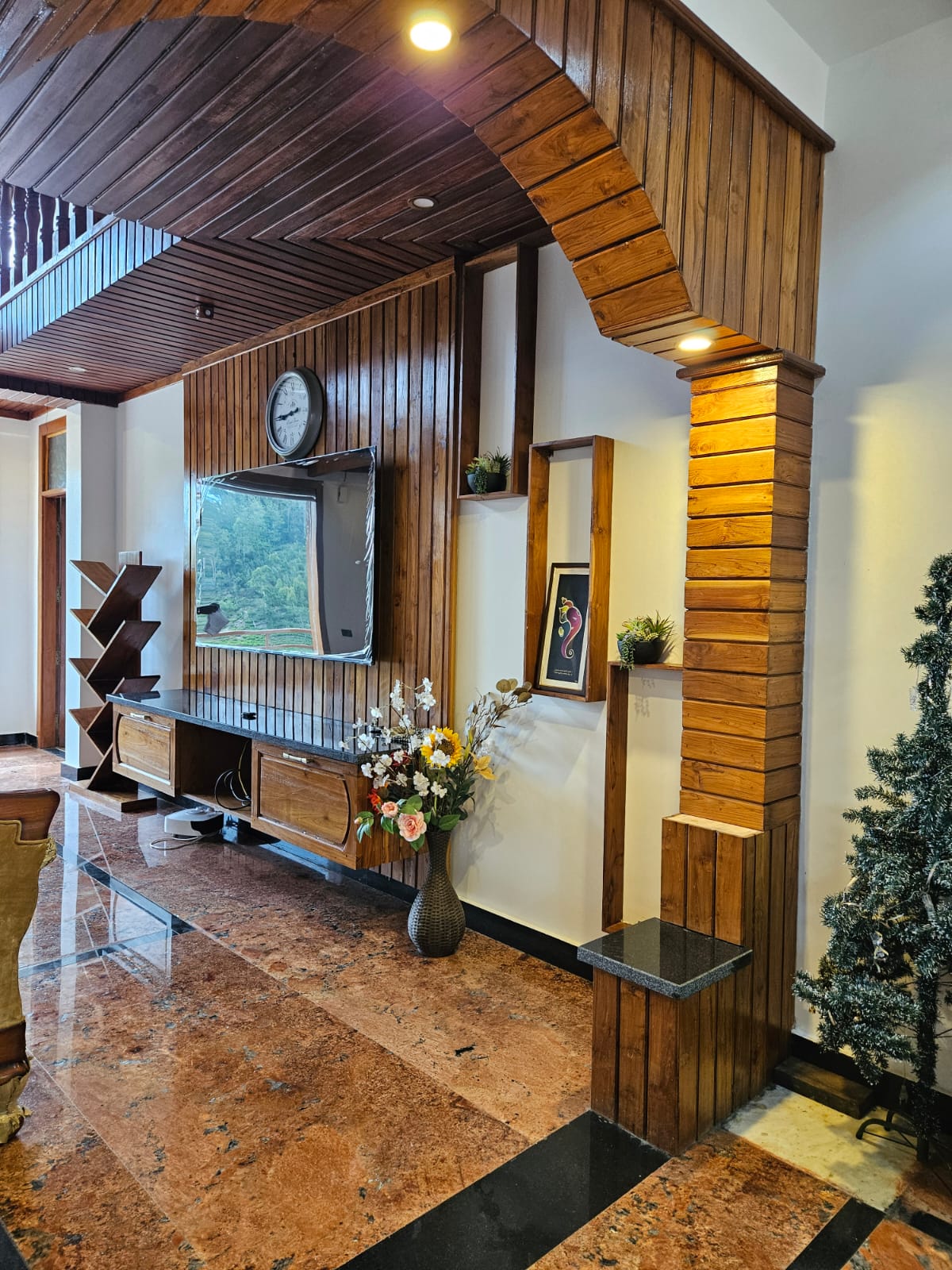 Wooden interior with television and warm decor